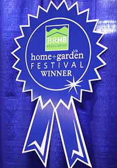 Serenescapes as the winner of the "Best in Show" award at the 2015 Blue Ridge Home Builders Association Home and Garden Show in Charlottesville, Va