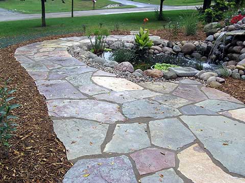 flagstone walkway and pond flagstone walkway encircling a pond